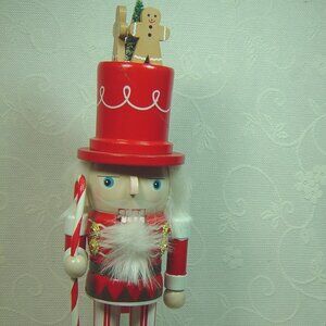 Red & white candy cane/peppermint stick nutcracker--10 3/4" tall
